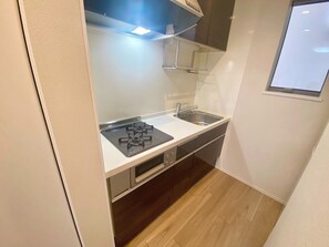 Fridge, microwave, stovetop, cookware/dishes/utensils