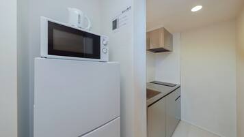 Fridge, microwave, stovetop, cookware/dishes/utensils