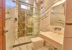 Shower, free toiletries, towels, soap