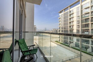 Luxury Apartment, Balcony, Lagoon View | Balcony - Manzil - 1BR Urban Living near Downtown  (Dubai)