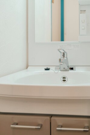 Hårføner og håndklær