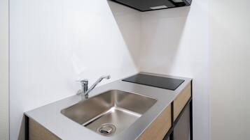 Fridge, microwave, stovetop, cookware/dishes/utensils