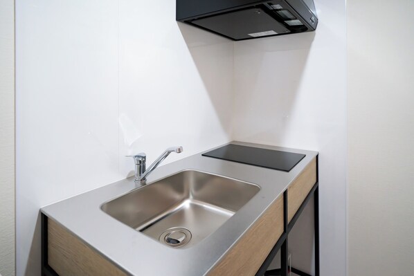 Fridge, microwave, stovetop, cookware/dishes/utensils