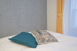 2 室のベッドルーム、WiFi (無料)、ベッドシーツ