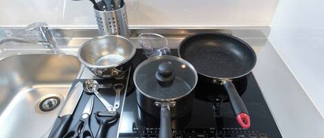 Fridge, microwave, stovetop, cookware/dishes/utensils