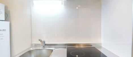 Fridge, microwave, stovetop, cookware/dishes/utensils