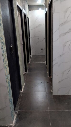 Shared Dormitory | Bathroom | Shower, towels, soap