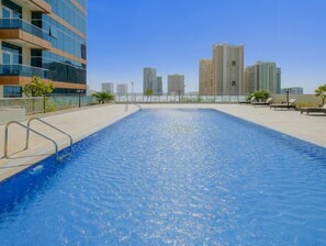 Pool - Peaceful 1BR with Urban Outlook, Near a Park, 15-Minute Drive to Miracle Garden (Dubai)