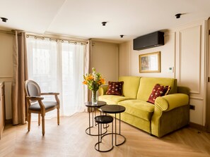 Apartament | Sala d'estar | Televisor intel·ligent, Netflix, serveis de streaming i oficines 