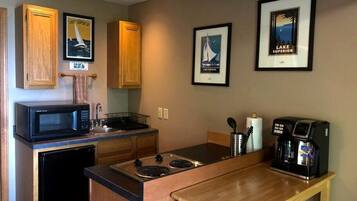 Fridge, microwave, stovetop, coffee/tea maker