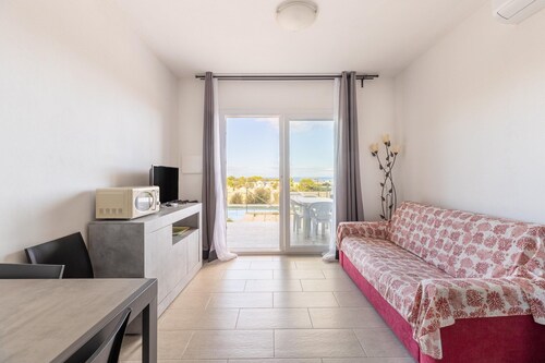 Air-conditioned, in residence, with pool and patio
