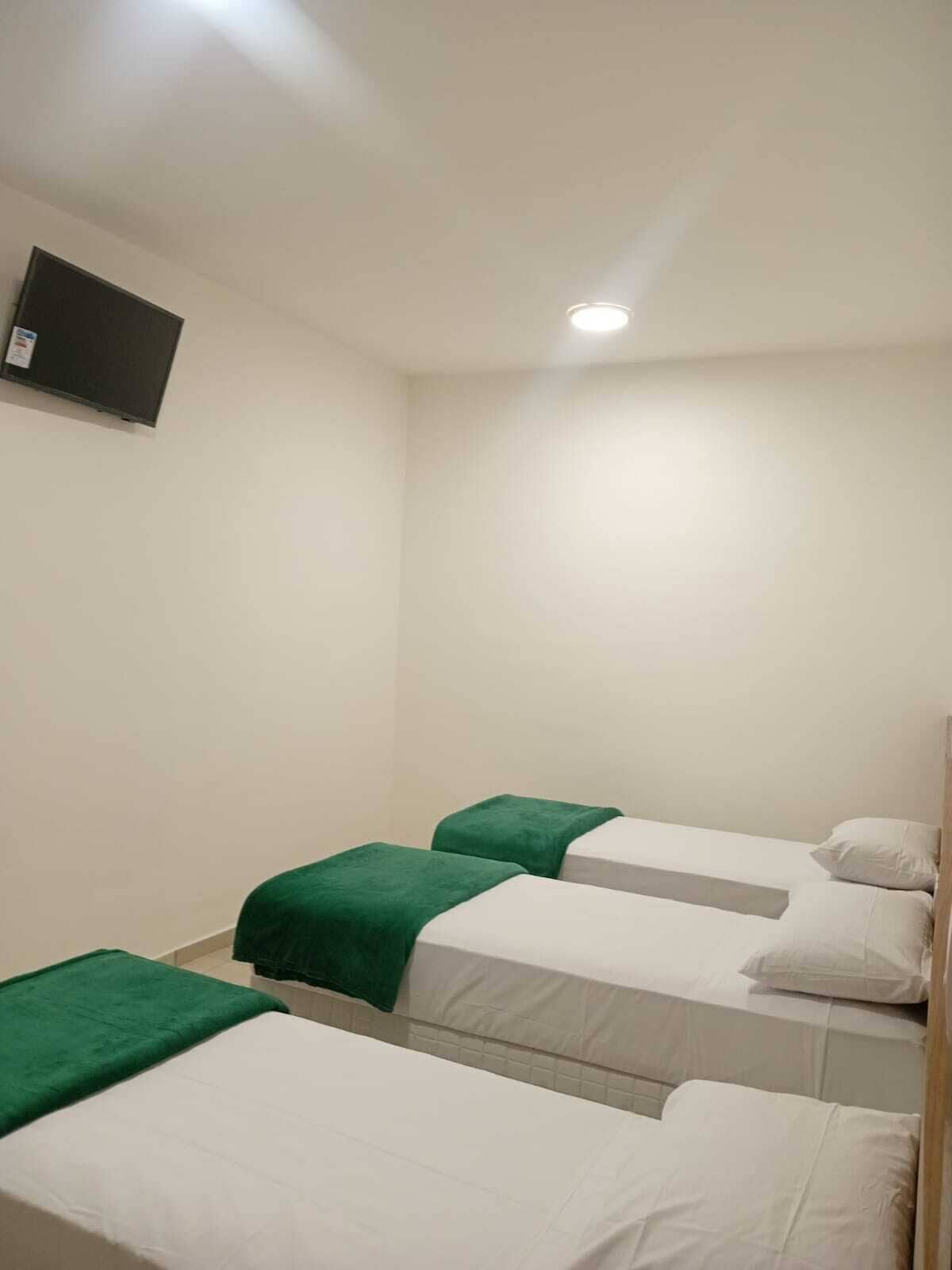 Desk, laptop workspace, free WiFi, bed sheets