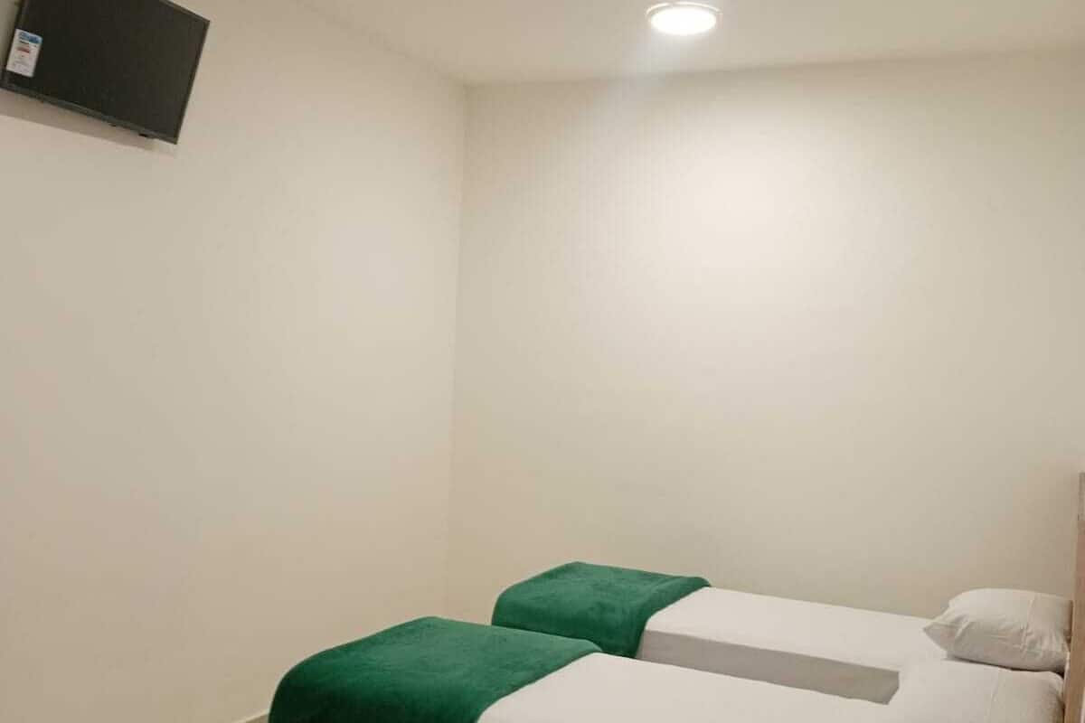 Desk, laptop workspace, free WiFi, bed sheets