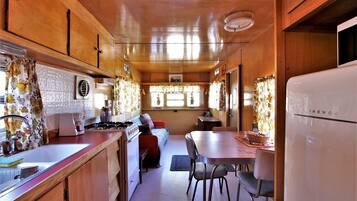 Fridge, microwave, stovetop, cookware/dishes/utensils