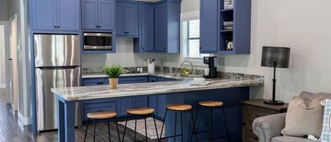 Coffee/tea maker, fridge, microwave, stovetop