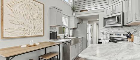 Coffee/tea maker, fridge, microwave, dishwasher