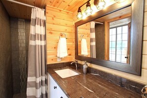 Jetted tub, hair dryer, towels, soap