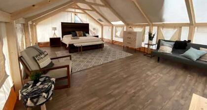 Romantic Lakefront Safari Tent with Fire Pit and Peaceful Views near Bastrop, Texas