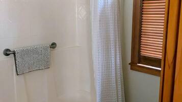 Hair dryer, towels, soap, shampoo