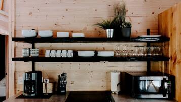 Coffee/tea maker, fridge, microwave, oven