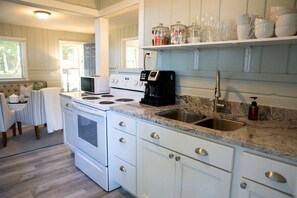 Private kitchen - Lakeside Cabin Rental with Beach Access and Fire-Pit for Relaxing Getaways to Lake Michigan (Muskegon)