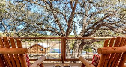 Glamping Vacations in a Luxury Tented Cabin near River Guadalupe, in Ingram, Texas