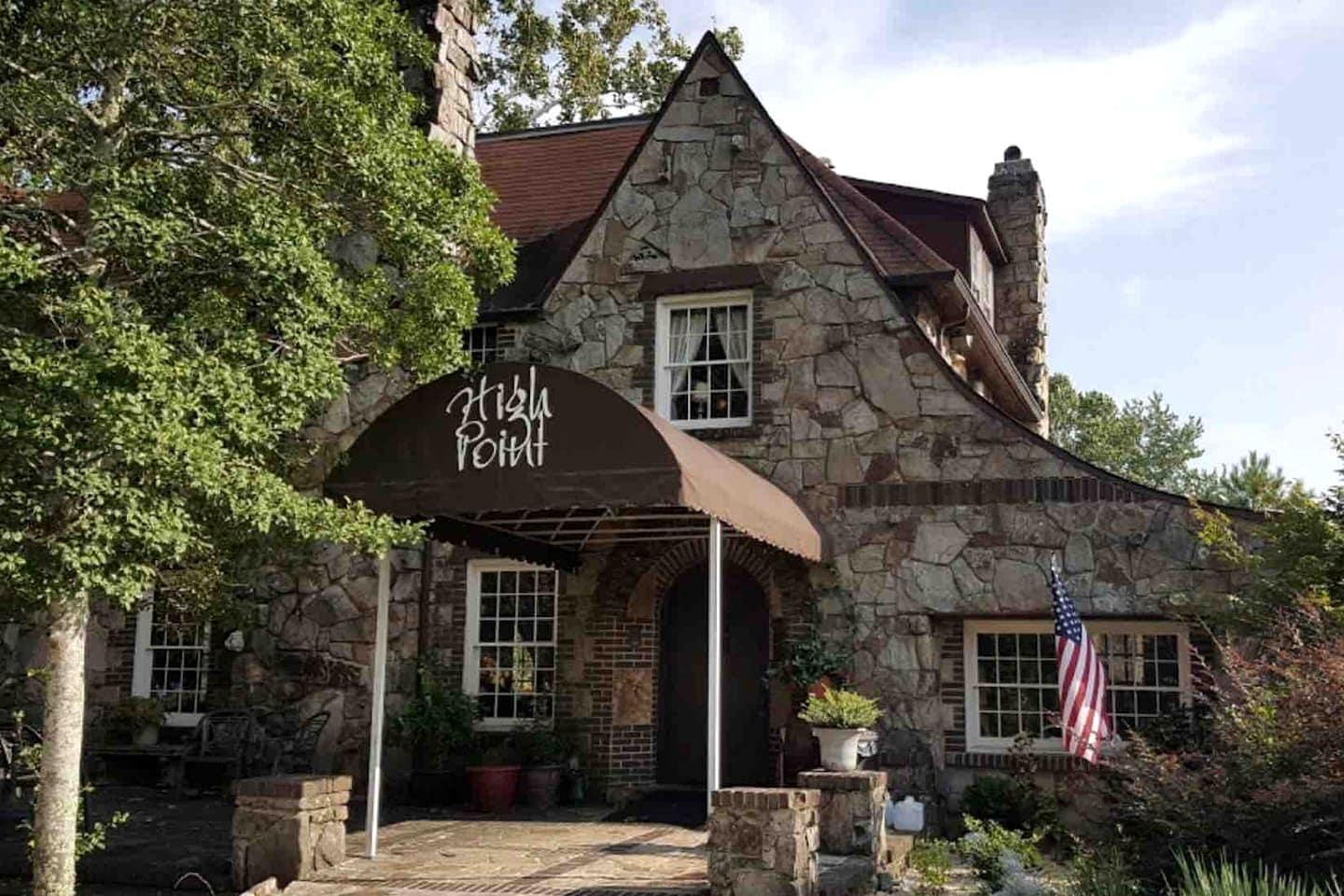A stone building with a sign reading 'High Point.'