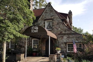 A stone building with a sign reading 'High Point.'