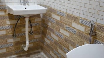 Classic Double Room, Balcony, City View | Bathroom | Shower, slippers, towels, soap