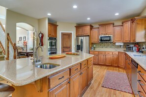 Dishwasher, coffee/tea maker, cookware/dishes/utensils, dining tables - Upscale Group Getaway in Orem w/ Private Hot Tub (Orem)