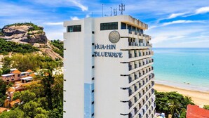 A multi-story hotel named Hua-Hin Bluewave with a view of the beach and ocean. - Beachfront Studio Condo-Seaview BW1 (Hua Hin)