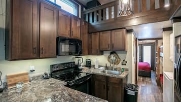 Fridge, microwave, stovetop, coffee/tea maker