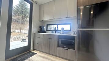 Fridge, microwave, stovetop, coffee/tea maker