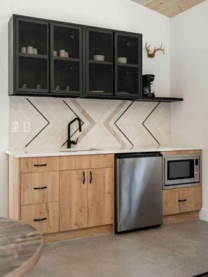 Fridge, microwave, coffee/tea maker, toaster