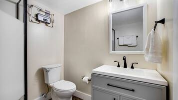 Hair dryer, towels, soap, shampoo