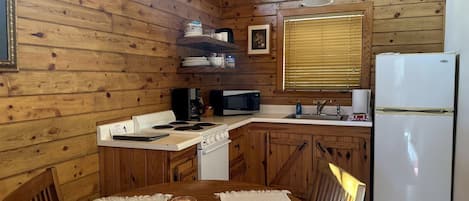 Coffee/tea maker, fridge, microwave, oven