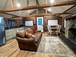 TV - Charming Riverfront Cabin with Hot Tub and Dock Access Near Scenic Trails in Island Park, Idaho (Island Park)