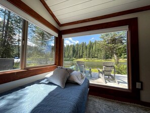 2 bedrooms, WiFi, bed sheets - Charming Riverfront Cabin with Hot Tub and Dock Access Near Scenic Trails in Island Park, Idaho (Island Park)