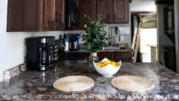 Fridge, microwave, stovetop, coffee/tea maker