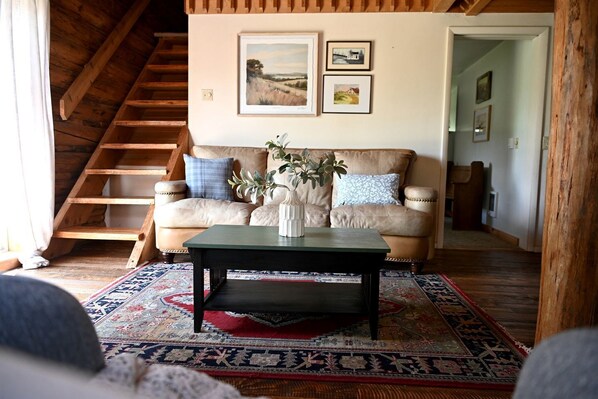 TV, fireplace, DVD player, video library - Scenic Mountain Cabin with Hot Tub & Ski-In Access near National Parks in Island Park, Idaho (Driggs)