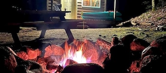 Porched Cabin for a Memorable Family Glamping Getaway near Wolf River in Wisconsin