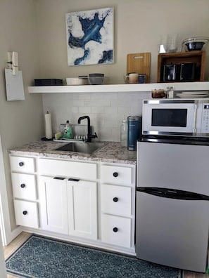 Fridge, microwave, coffee/tea maker, toaster