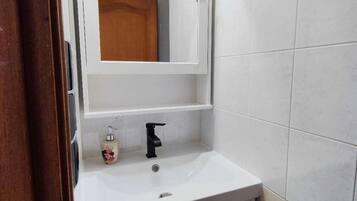 Hair dryer, towels, soap, toilet paper