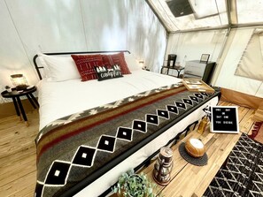 1 bedroom, bed sheets - Georgia Glamping Getaways in this Luxury Safari Tent Rental in the Heart of Nature (Helen)