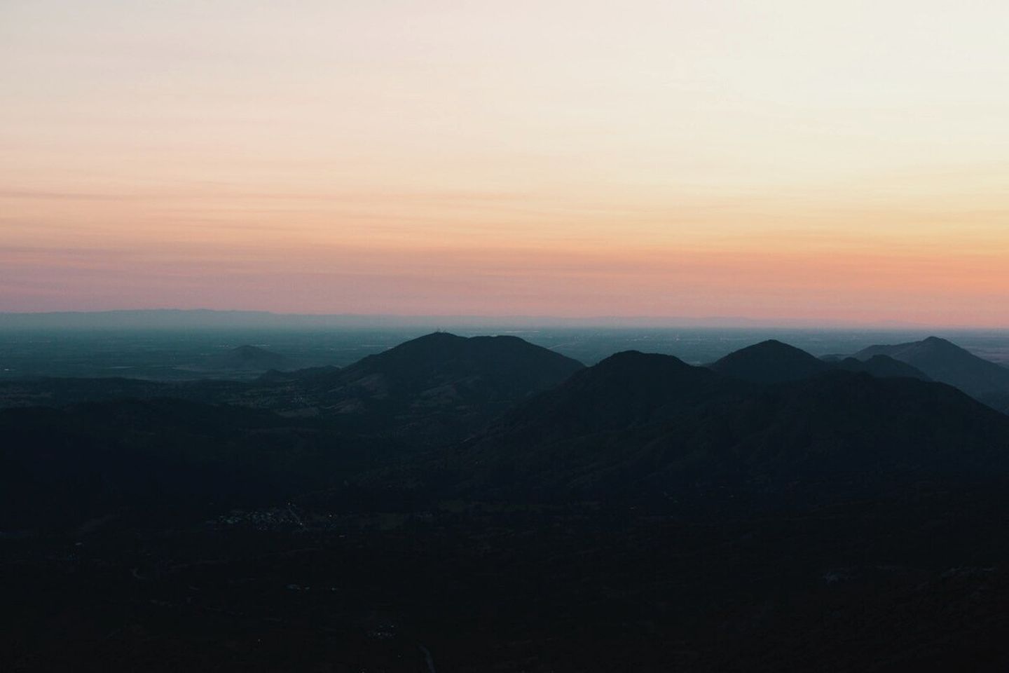 A mountainous landscape with a clear sky.