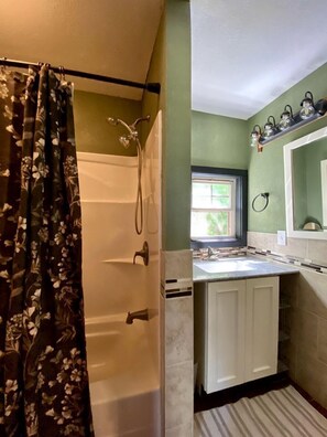 Hair dryer, towels, soap, shampoo