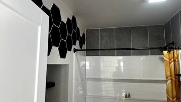 Jetted tub, hair dryer, towels, soap