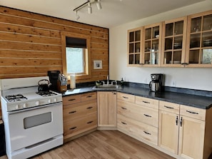 Fridge, stovetop, coffee/tea maker, electric kettle - Charming Log Cabin Rental in the Heart of Wrangell-St. Elias National Park and Preserve in Alaska (McCarthy)