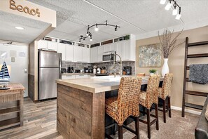 Fridge, microwave, oven, stovetop - Direct Oceanfront Two Bedroom Condo with Pool (Ocean City)