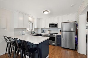 Fridge, microwave, oven, stovetop - Three Bedroom Condo with Pool in North Ocean City (Ocean City)
